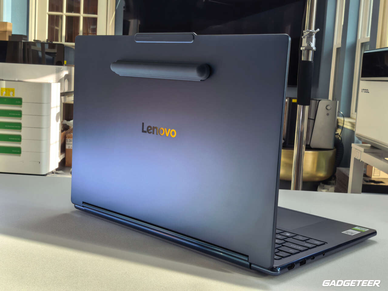 Rear of the open Lenovo Yoga 9n with its closed magnetic pen holder