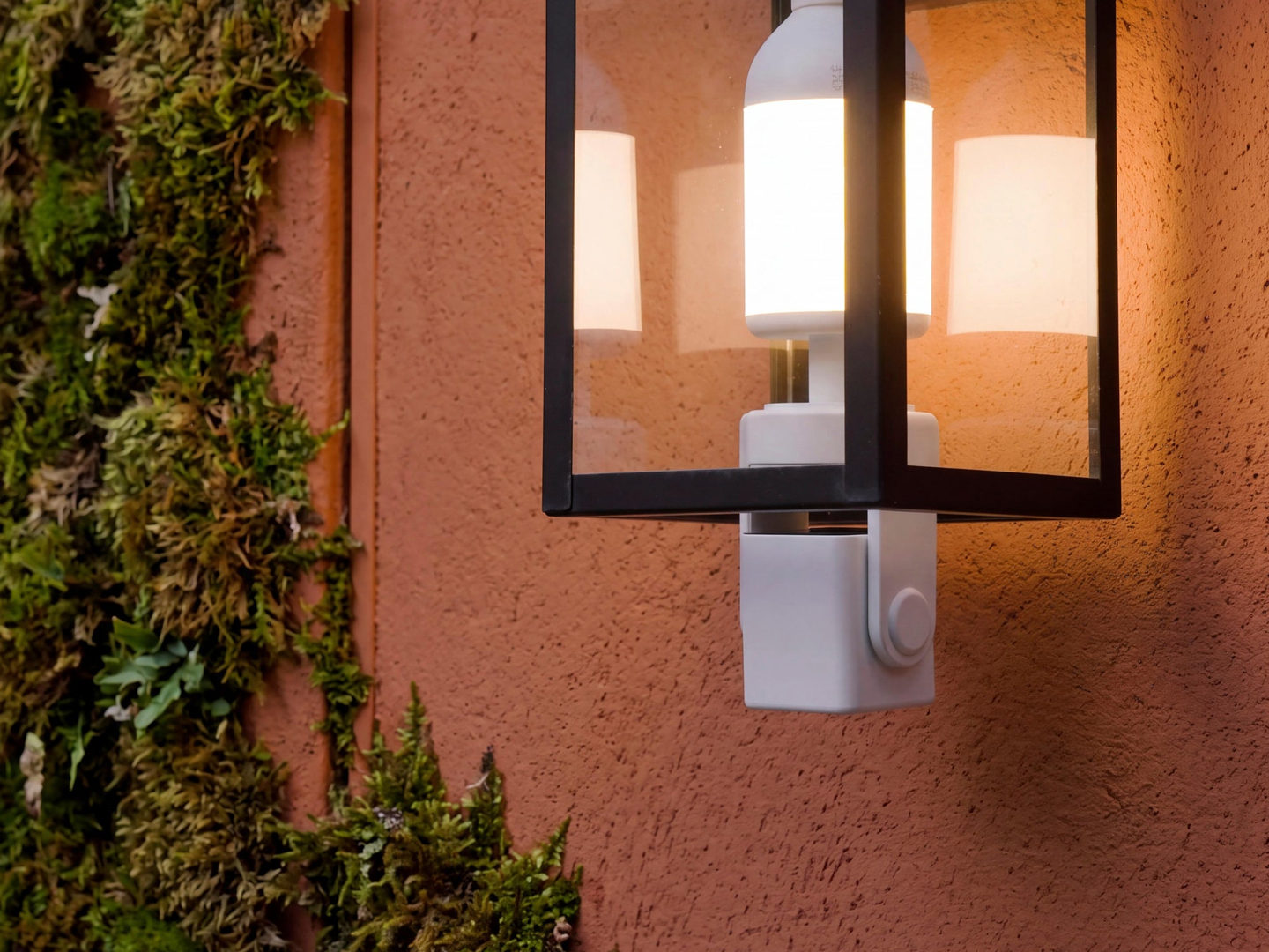 Wyze Bulb Cam Pan Color beneath a fixture with its lens turned inward.