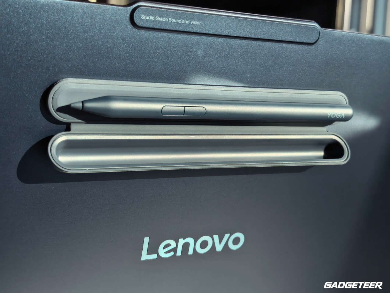 Open magnetic Yoga Pen holder attached to the laptop