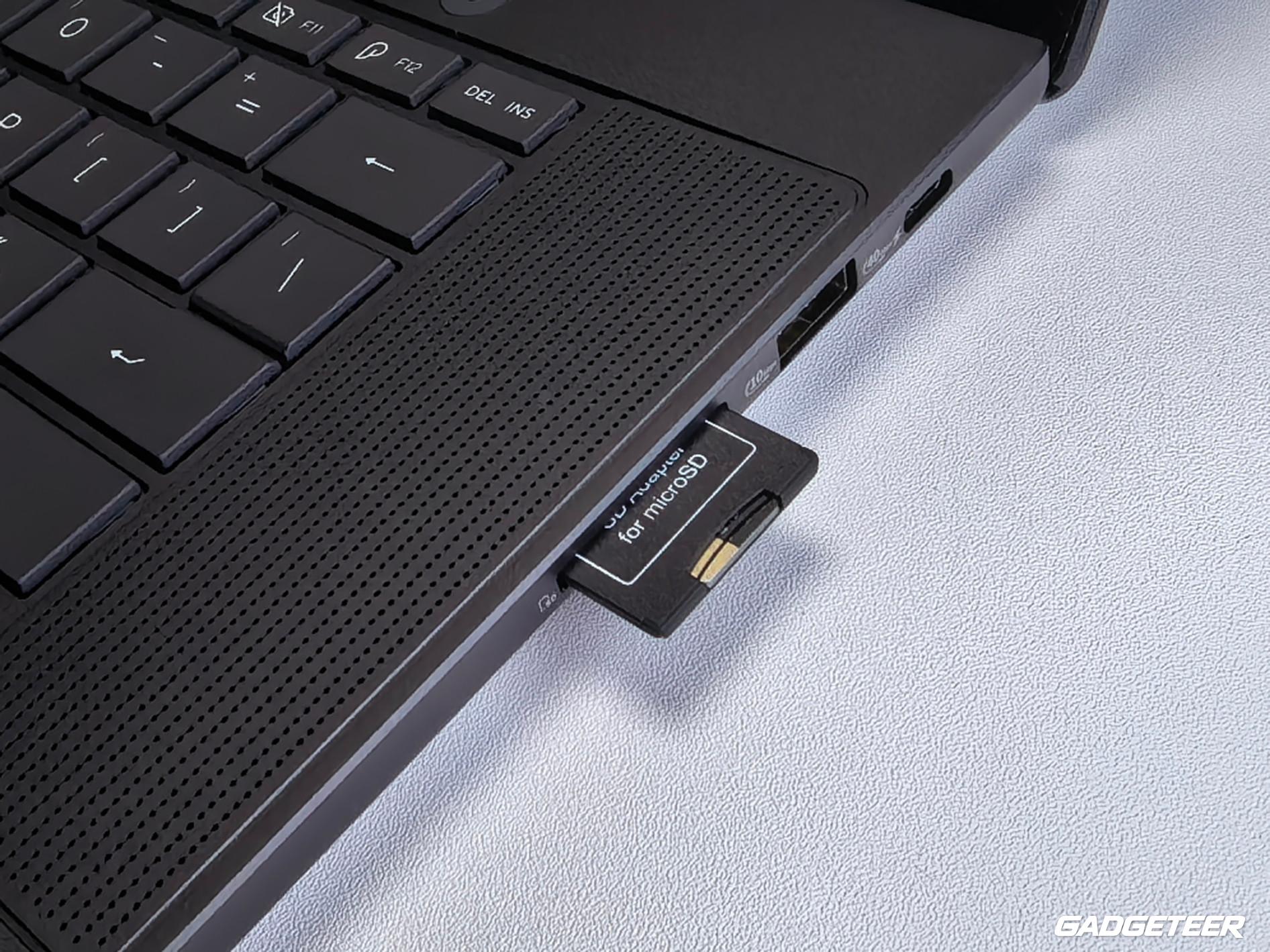 SD-format microSD adapter inserted in the ASUS ProArt P16 card reader.