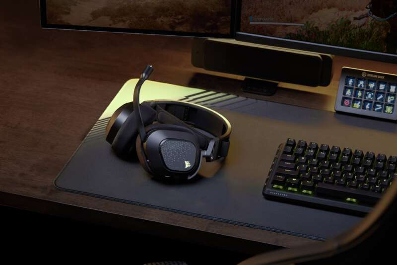 Corsair HS80 v2 MAX Wireless headset on a gaming desk