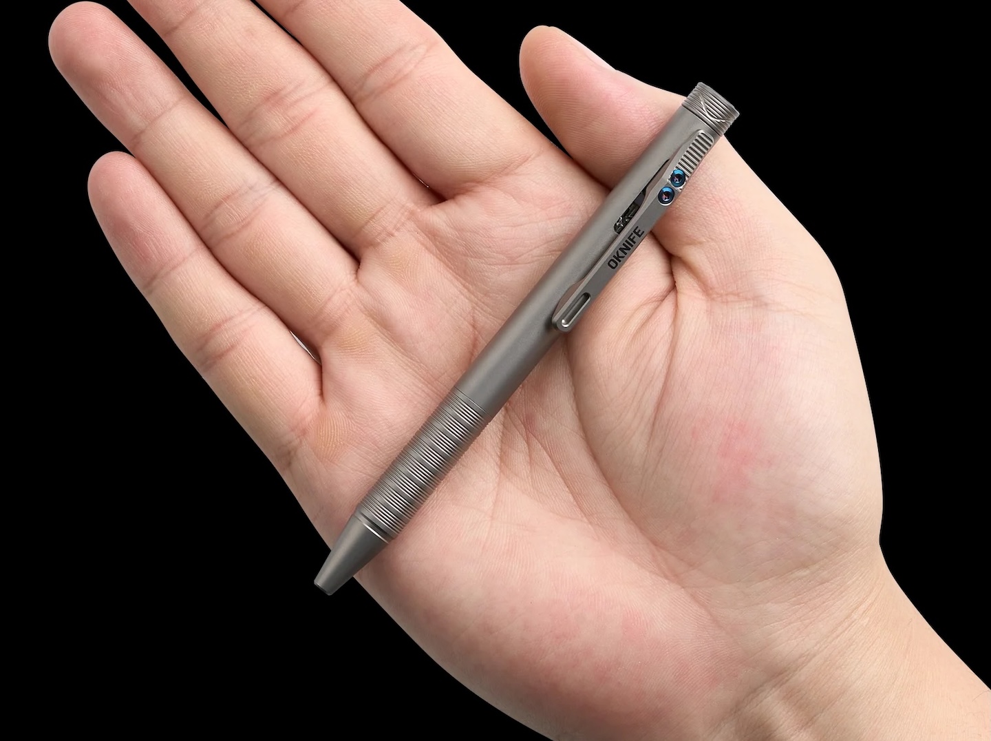 The OKNIFE B1 Ti Turns Its Pocket Clip Into the Click Mechanism
