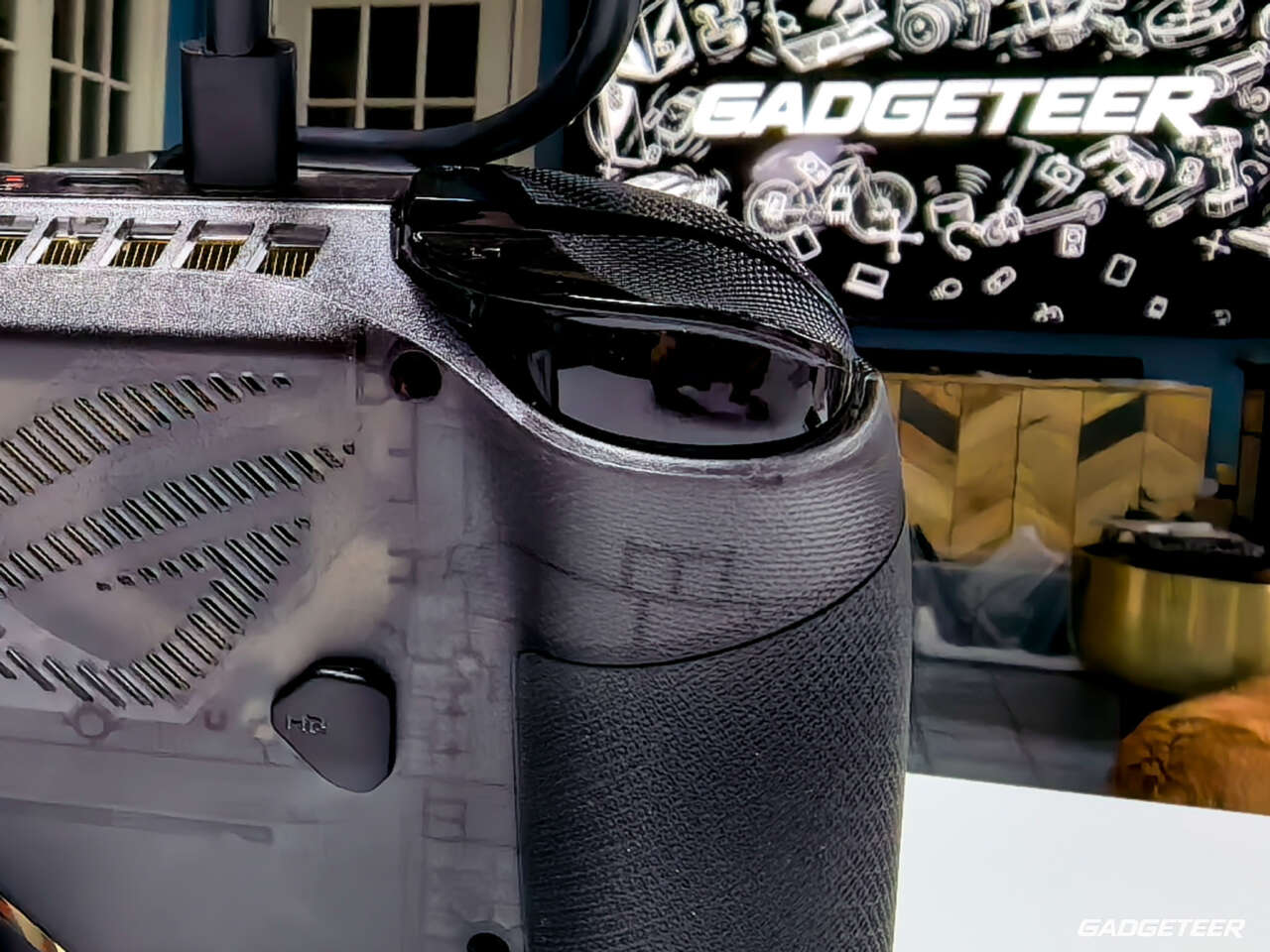 Rounded shoulder control and textured rear grip on the ROG Xbox Ally X20.