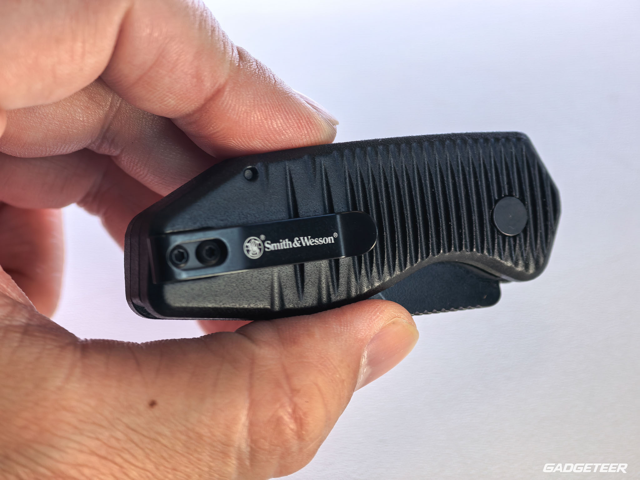 Smith & Wesson pocket clip mounted on the handle