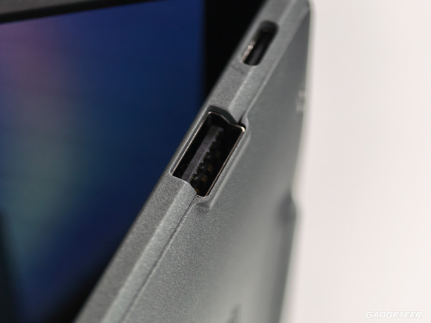 Close-up of the shaped edge around the ASUS Googlebook 14 right-side USB-A port.