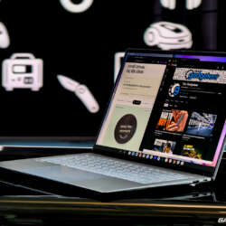 ASUS Googlebook 14 open with two browser windows on its matte display.