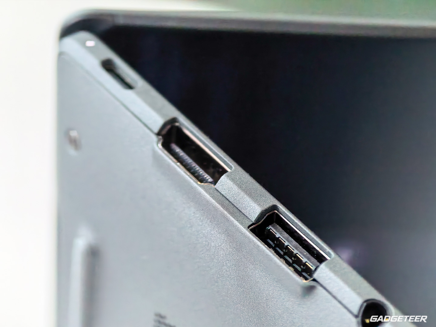 Close-up of the cut-back edge around the ASUS Googlebook 14 left-side HDMI and USB-A ports.