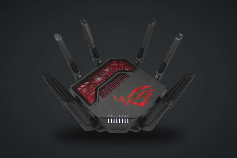 ASUS ROG Rapture GT-BE19000 router with eight antennas against a charcoal background
