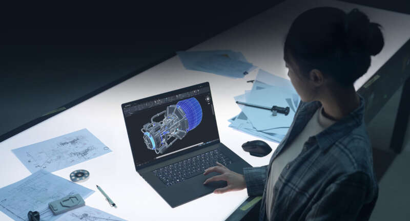 ASUS ProArt P16 on a creator desk with CAD work on screen