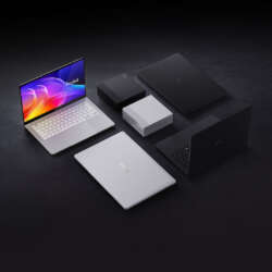 ASUS ProArt RTX Spark laptops and GR1X mini PCs arranged on a dark surface