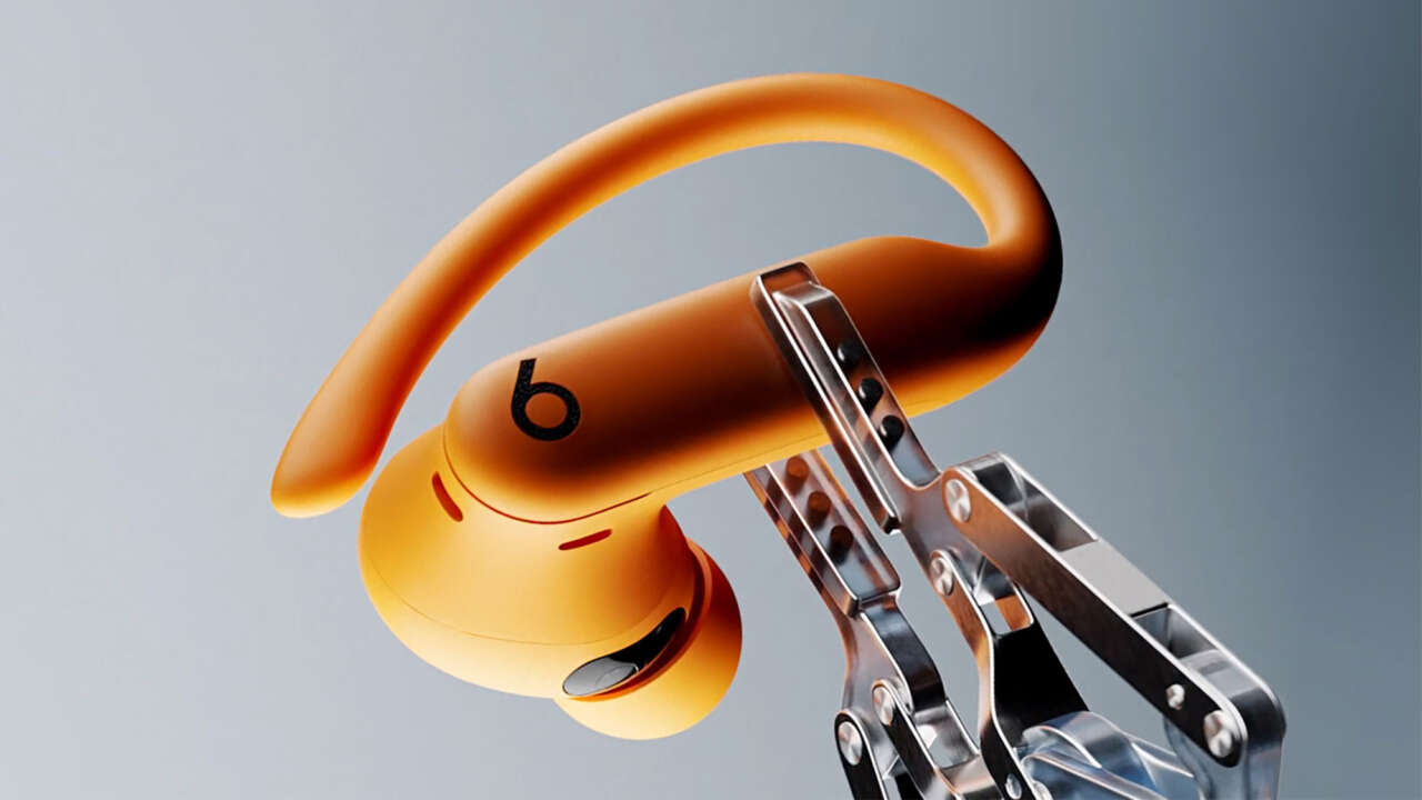 Orange Powerbeats Pro 2 earbud in an official Beats design photograph