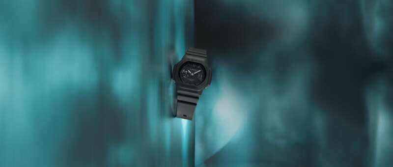 Black Casio G-SHOCK GAC-2500-1A watch against a teal background.