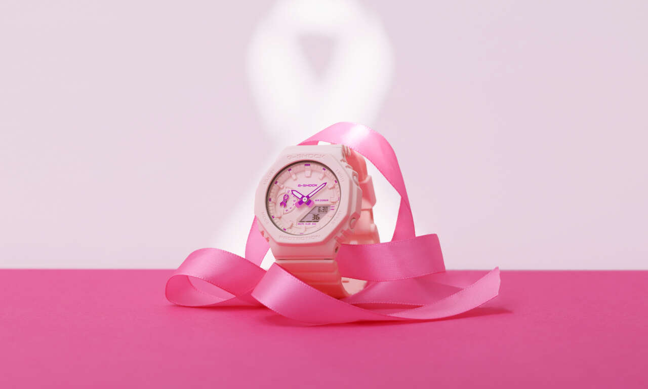 Casio G-Shock GMA-S2100PR-4A pastel-pink watch surrounded by a pink ribbon