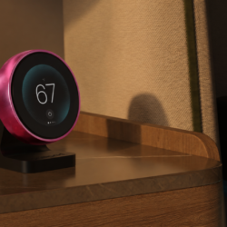 Chilipad 2.0 remote with pink accessory ring on a nightstand