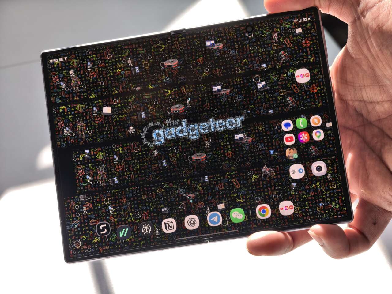 Vincent Nguyen holding his open Samsung Galaxy Z Fold8 with the inner display visible