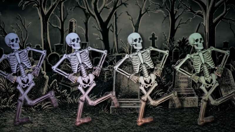 Four paper-style skeletons dancing in an illustrated graveyard