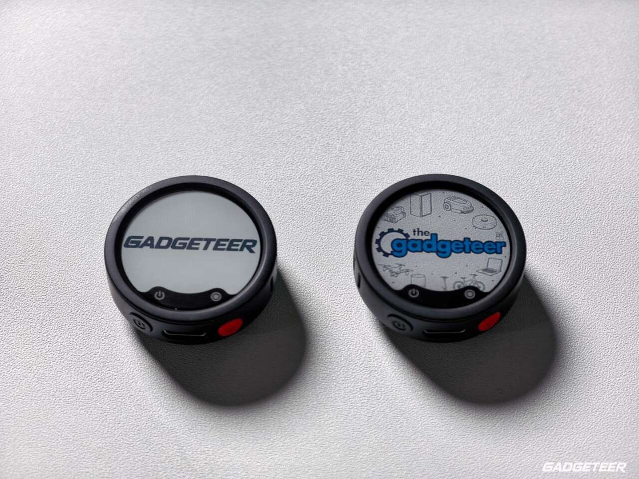 Two Insta360 Mic Pro transmitters with customized displays