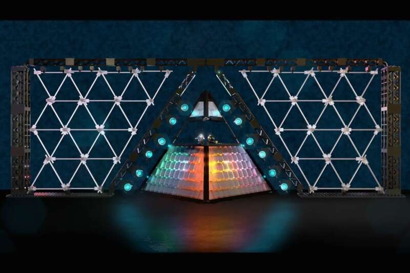 Daft Punk Concert fan model, not the final product, with two helmeted figures above a multicolored pyramid and wide stage panels.