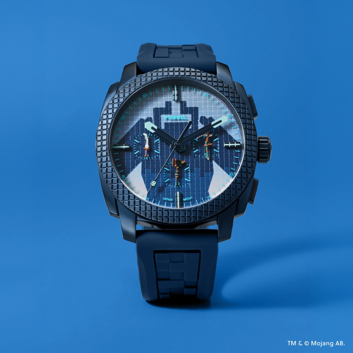 Blue Fossil Dungeons II watch with block-patterned navy silicone strap