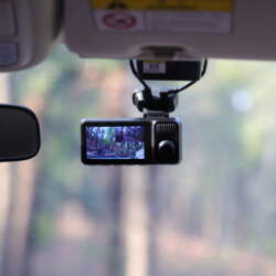 REDTIGER F17 Elite dash cam mounted beside a car's rearview mirror