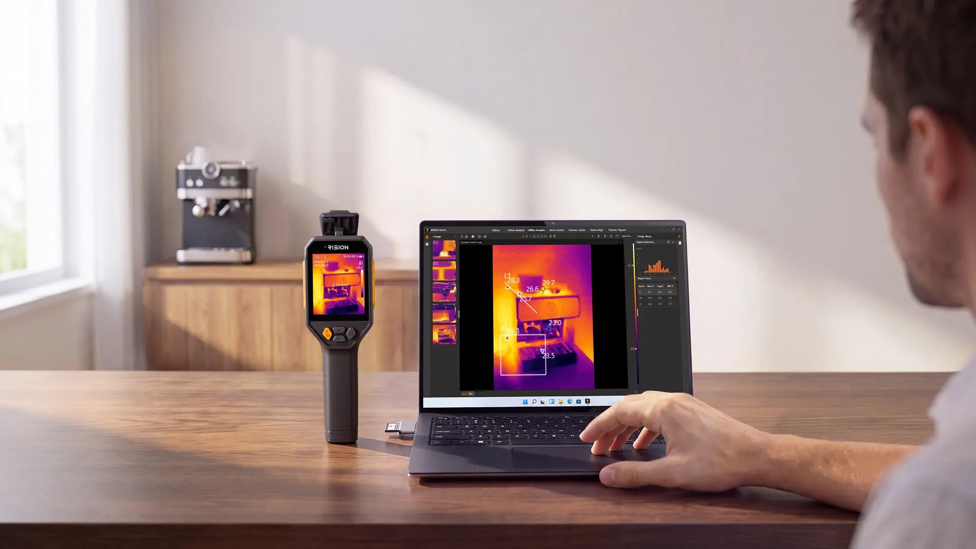 RISION Torix beside a laptop displaying thermal-image analysis in RISION Smart