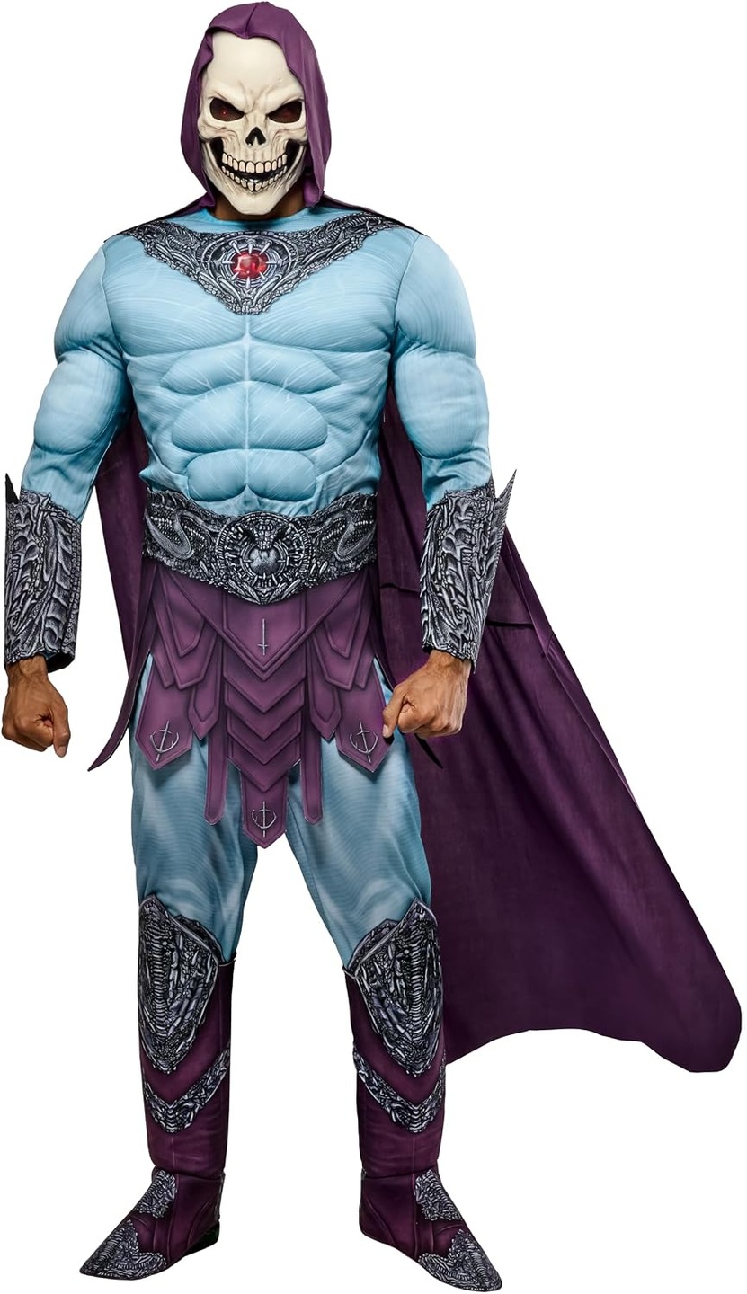 Model wearing the Rubies Skeletor adult costume with a skull mask, blue muscle-print suit and purple cape.