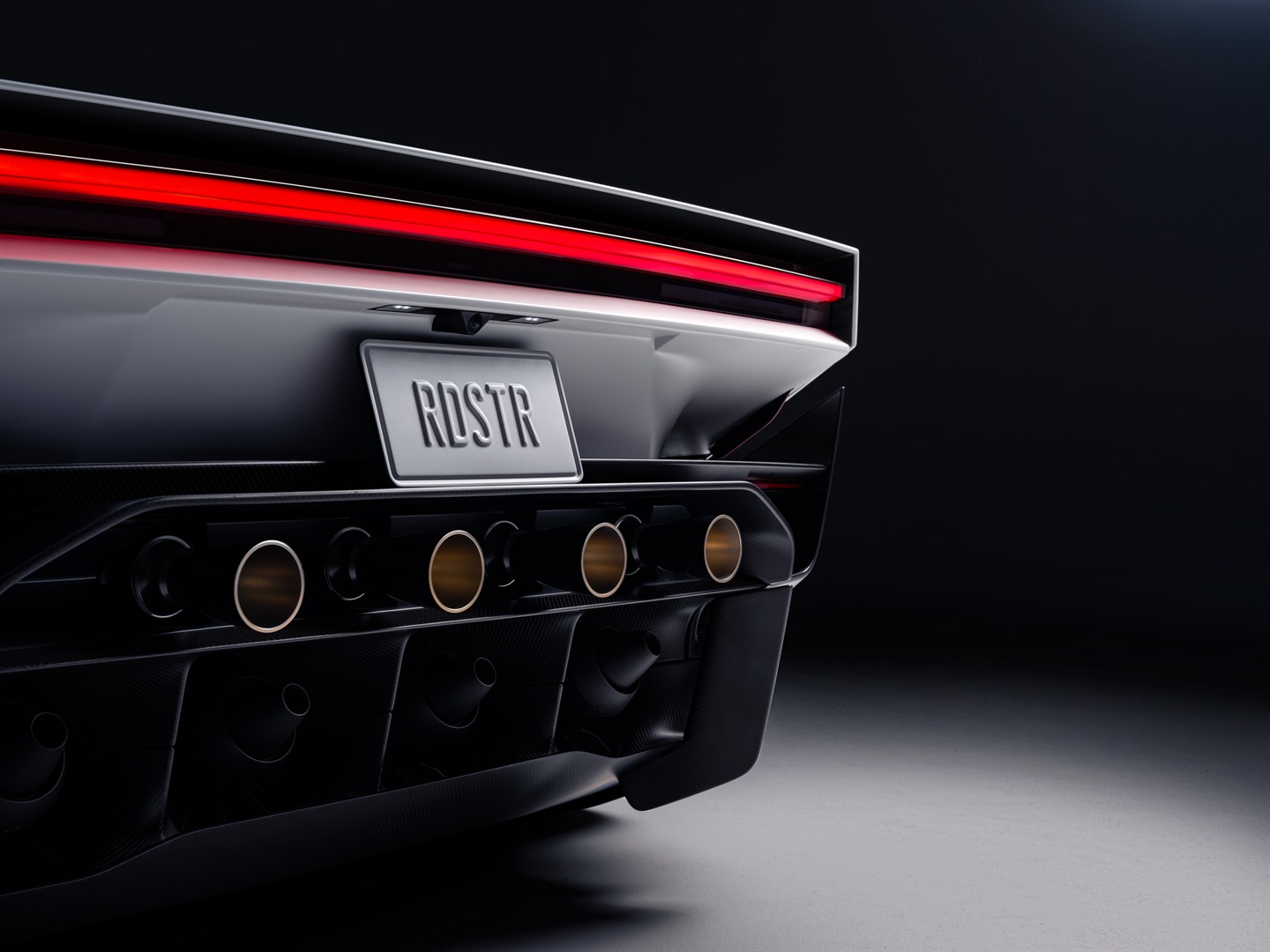 Tesla Roadster rear outlets detail.