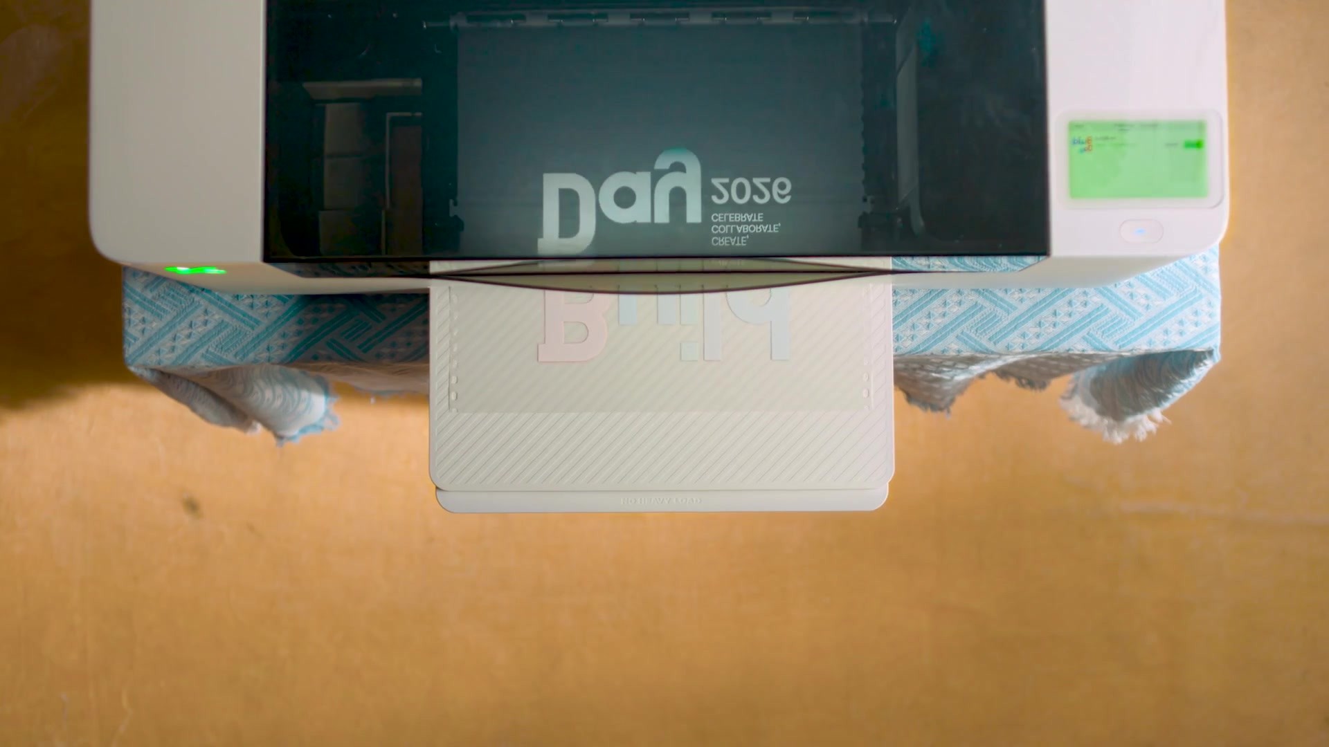 Overhead view of a shirt positioned in WonderPress.