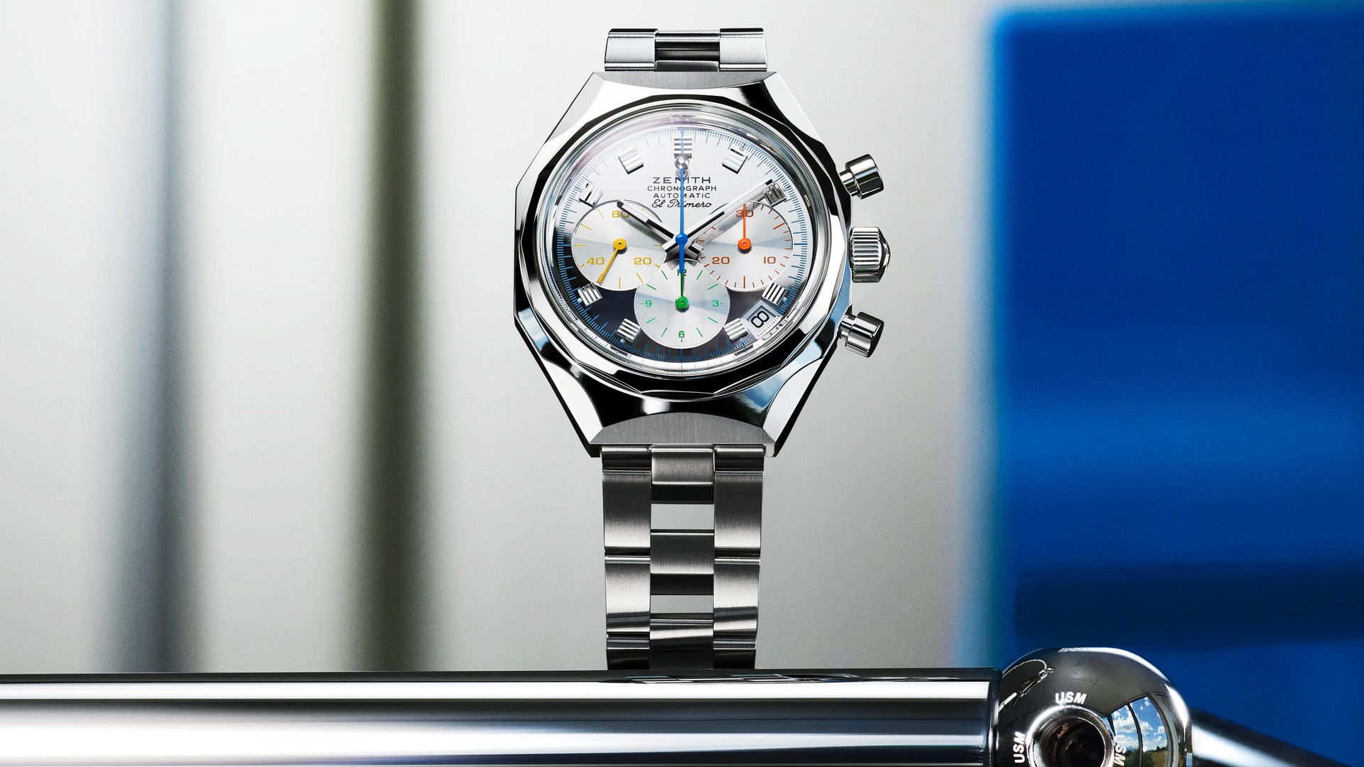 Close-up of the mirror-polished Zenith DEFY Chronograph USM TimeForArt dial with yellow, orange, green and blue details
