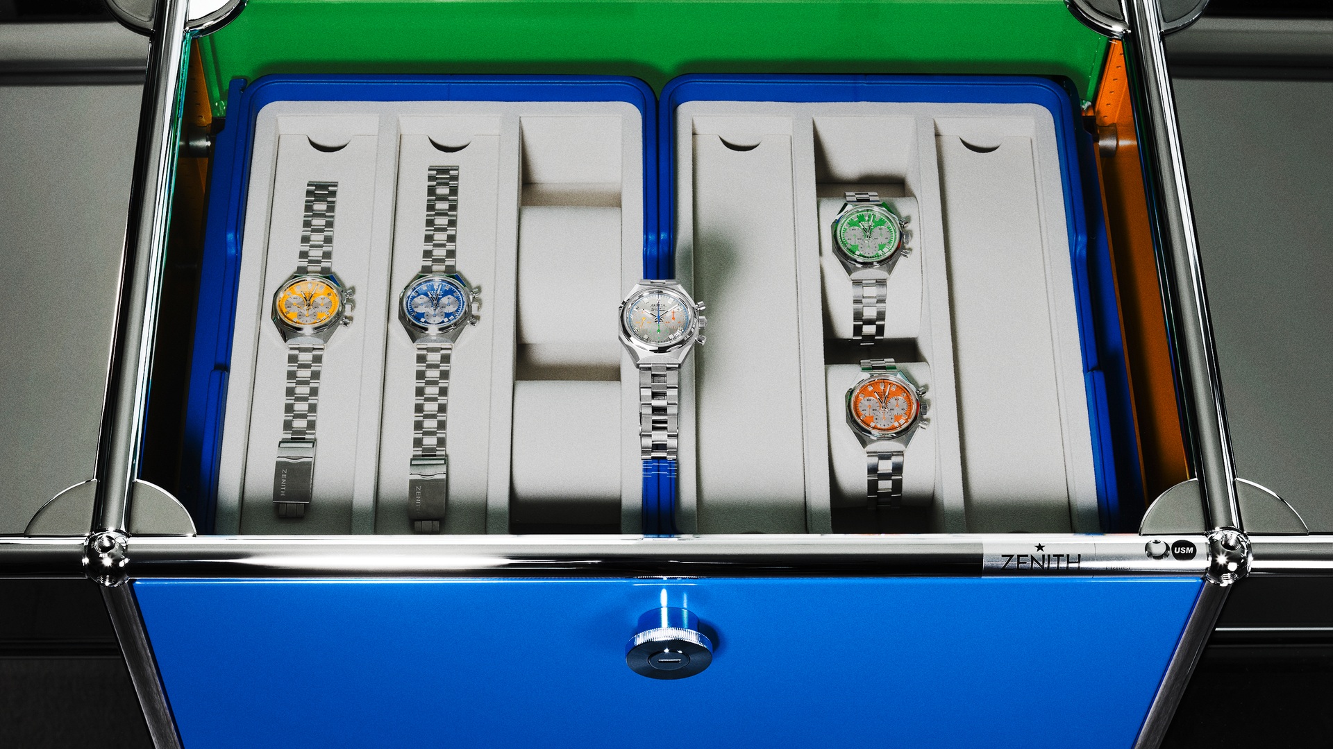 Zenith DEFY Chronograph USM TimeForArt mirror-dial watch with four colorful 2025 USM models displayed in the Haller sideboard